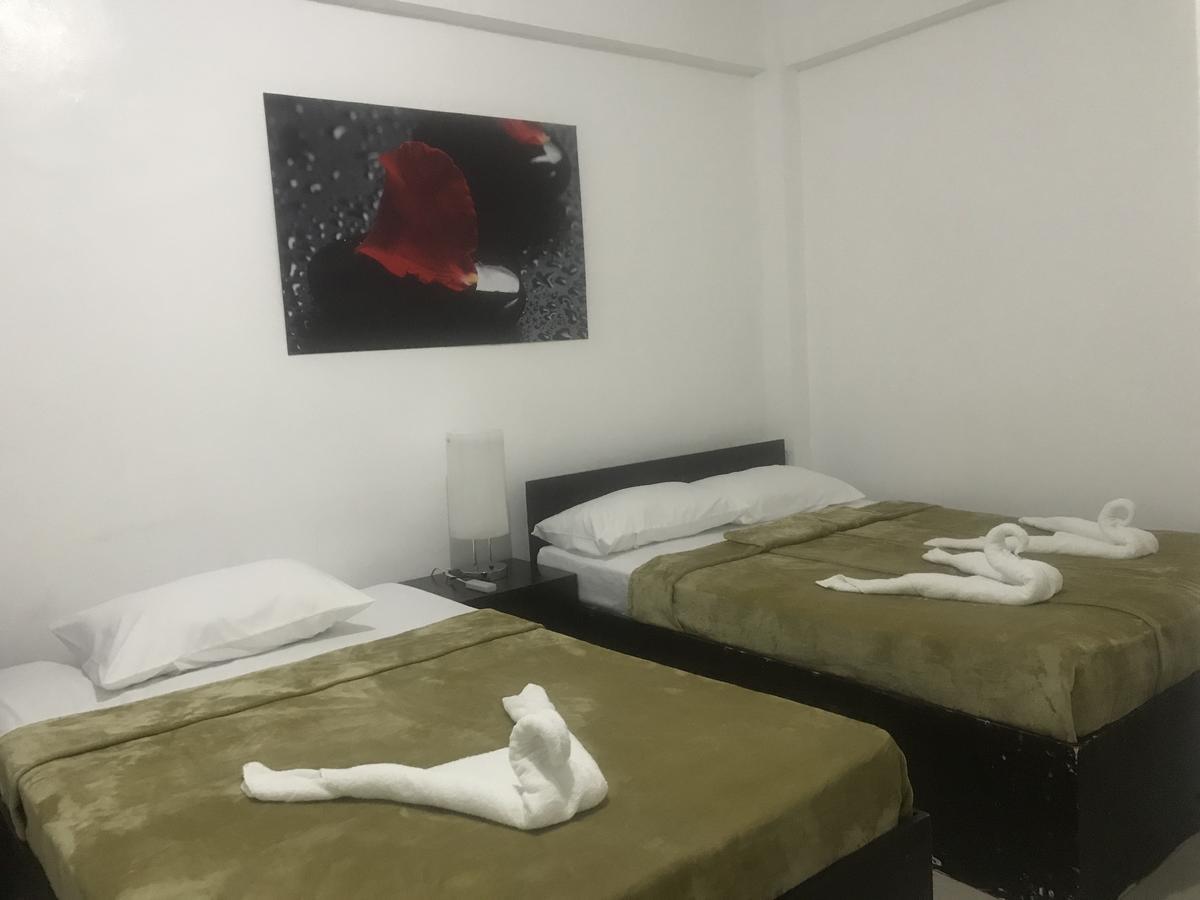 4C'S Tourist Lodge Puerto Princesa Ngoại thất bức ảnh