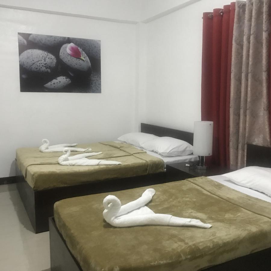 4C'S Tourist Lodge Puerto Princesa Ngoại thất bức ảnh