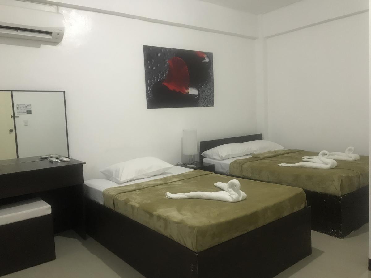 4C'S Tourist Lodge Puerto Princesa Ngoại thất bức ảnh