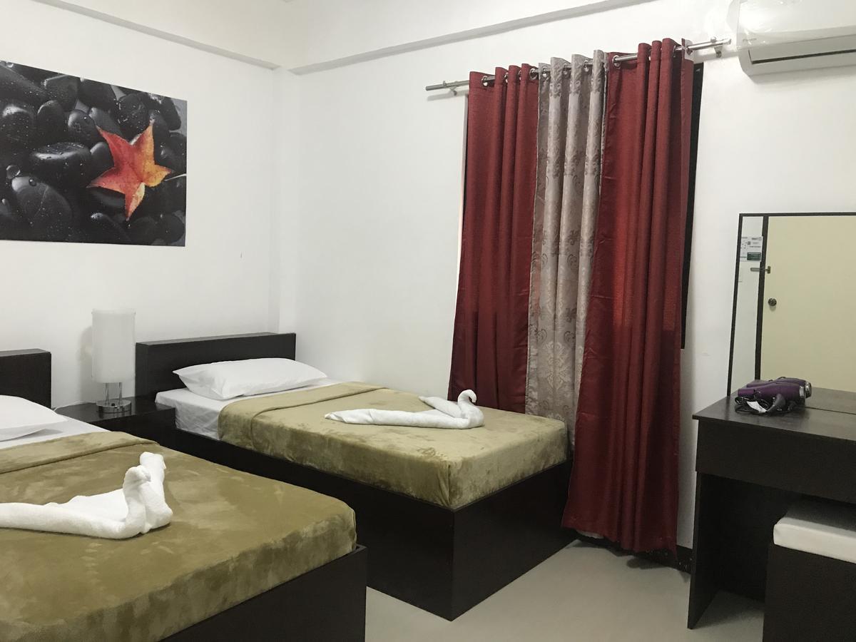 4C'S Tourist Lodge Puerto Princesa Ngoại thất bức ảnh