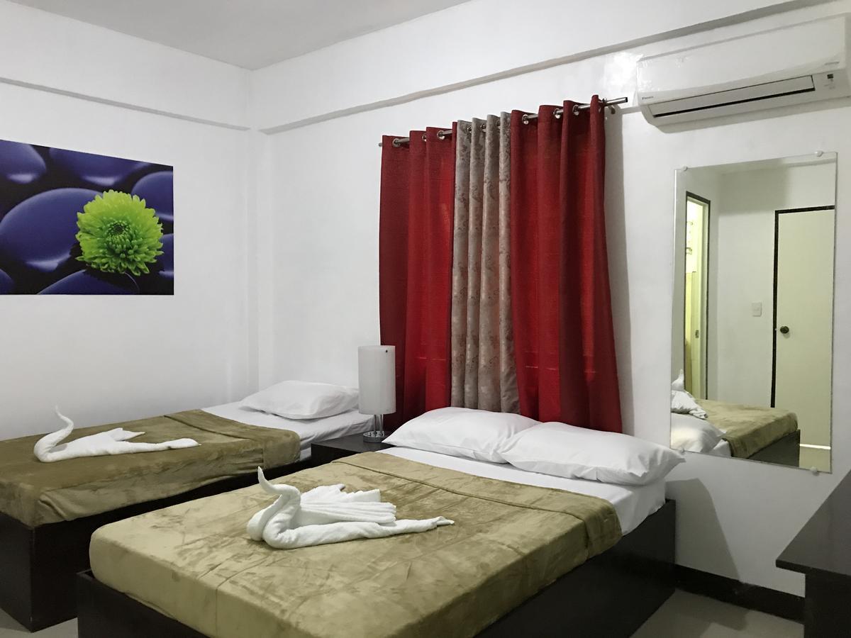 4C'S Tourist Lodge Puerto Princesa Ngoại thất bức ảnh