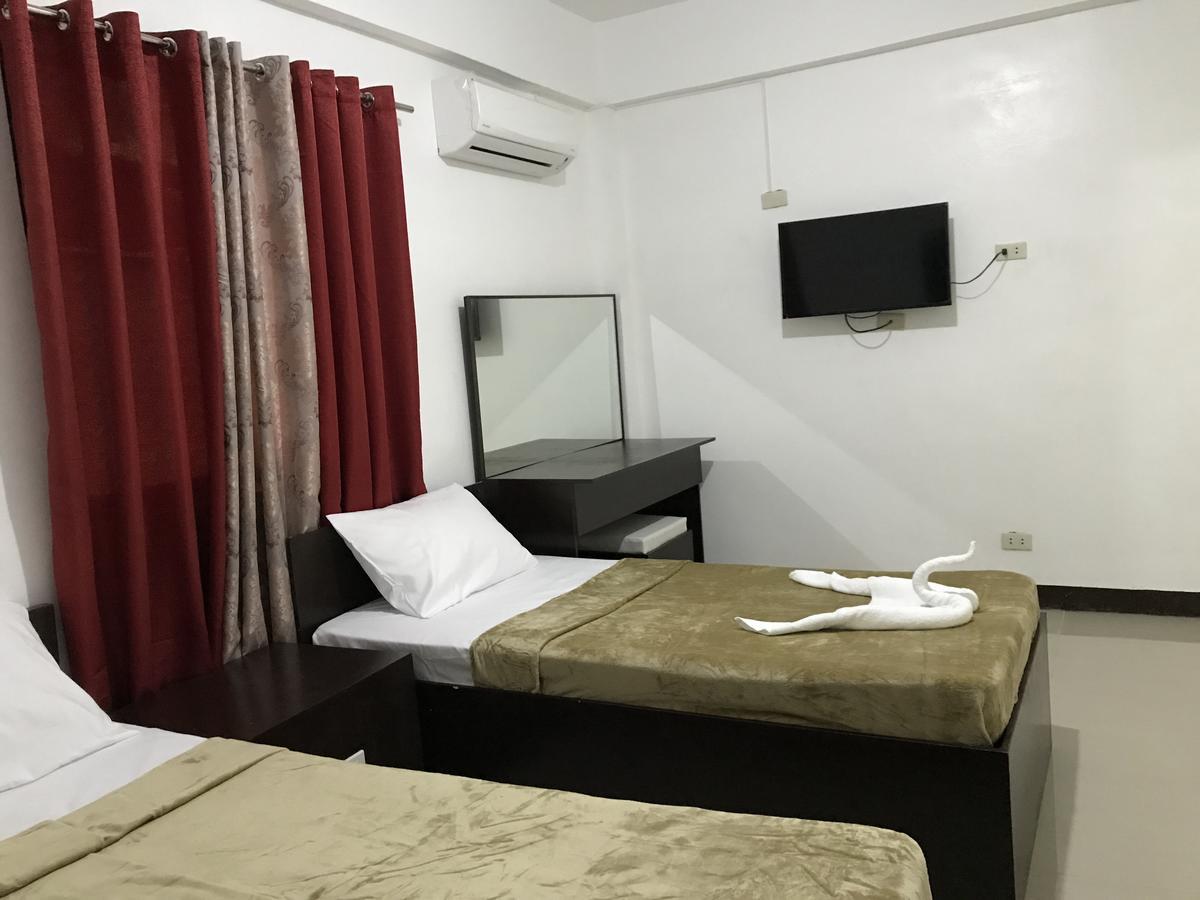 4C'S Tourist Lodge Puerto Princesa Ngoại thất bức ảnh