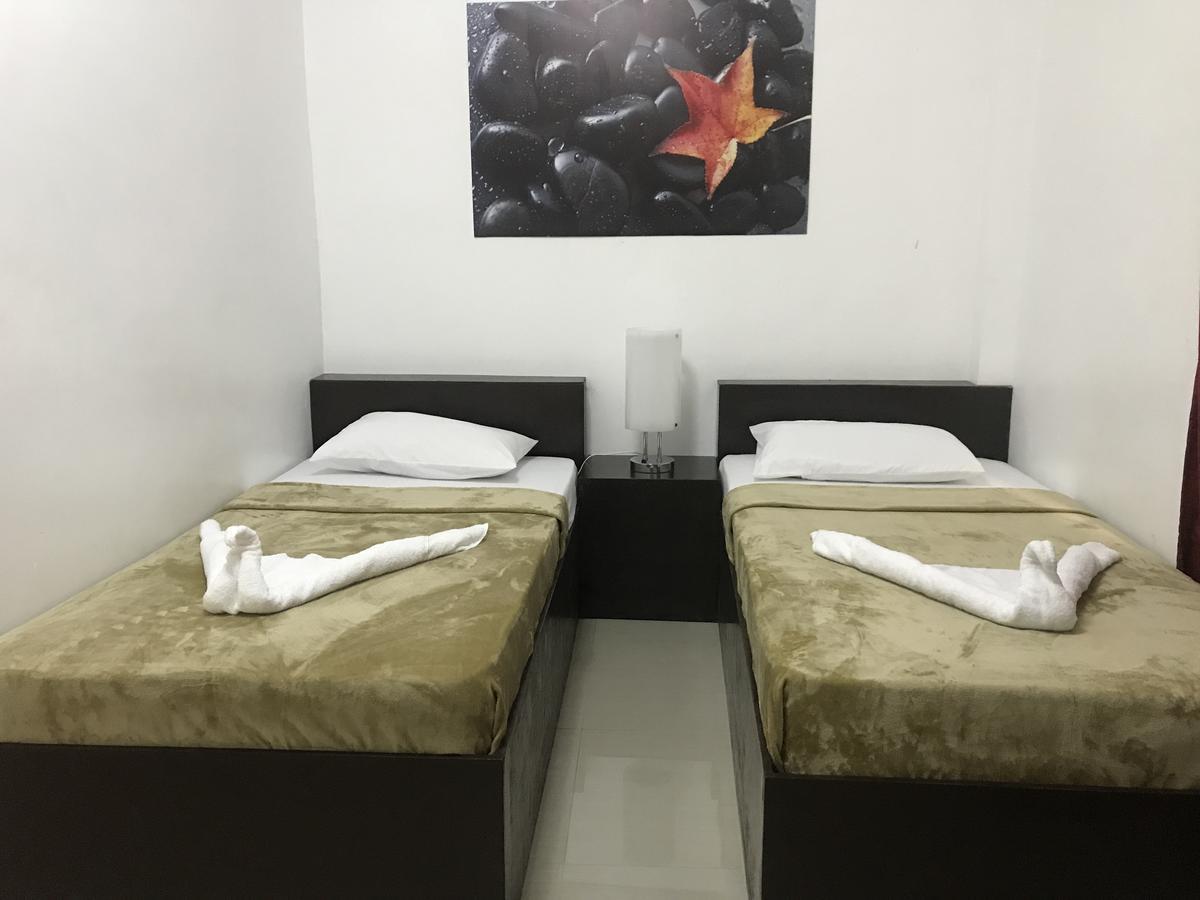 4C'S Tourist Lodge Puerto Princesa Ngoại thất bức ảnh