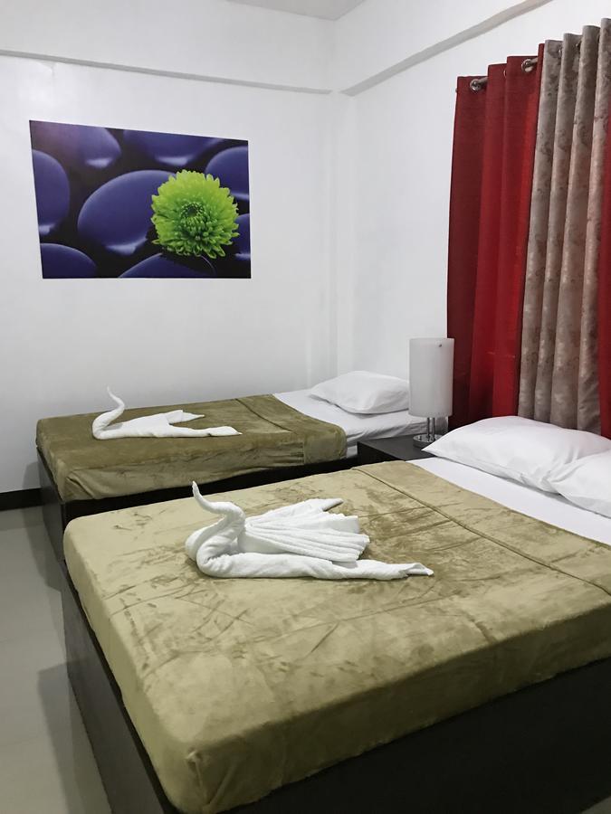 4C'S Tourist Lodge Puerto Princesa Ngoại thất bức ảnh