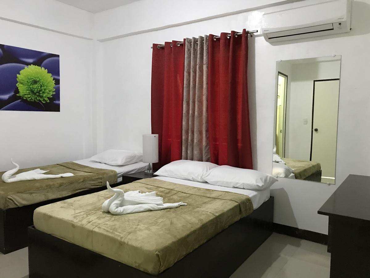 4C'S Tourist Lodge Puerto Princesa Ngoại thất bức ảnh