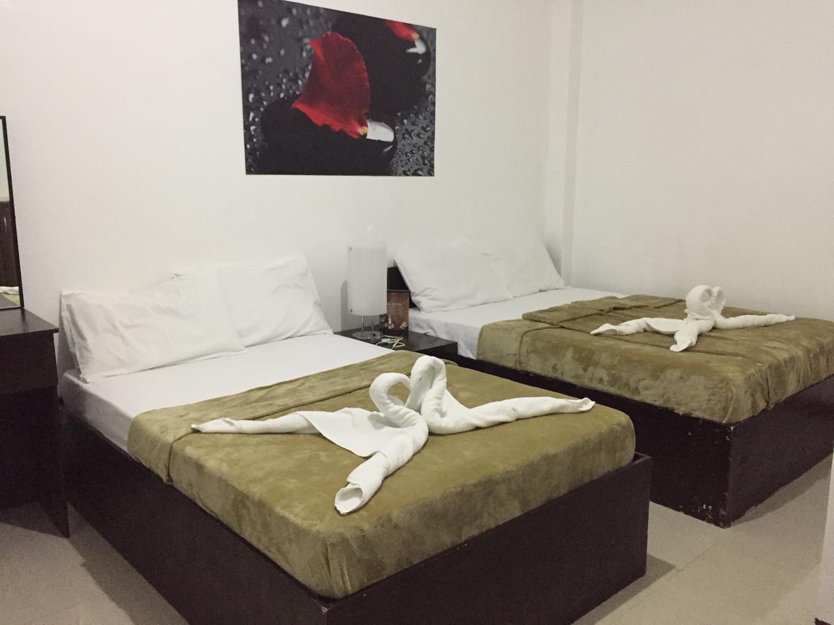 4C'S Tourist Lodge Puerto Princesa Ngoại thất bức ảnh