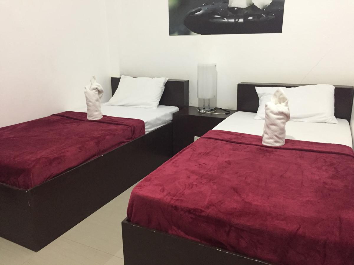 4C'S Tourist Lodge Puerto Princesa Ngoại thất bức ảnh