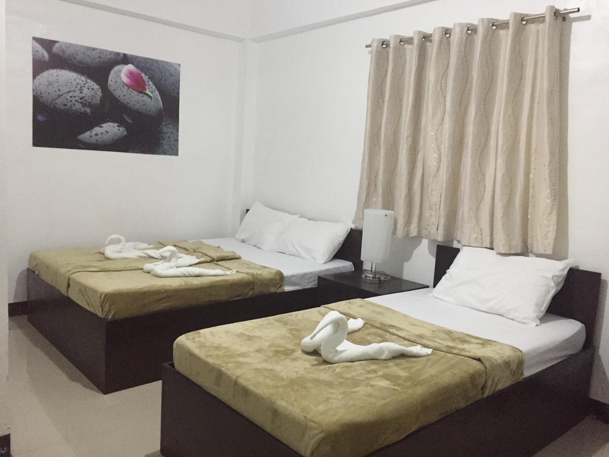 4C'S Tourist Lodge Puerto Princesa Ngoại thất bức ảnh