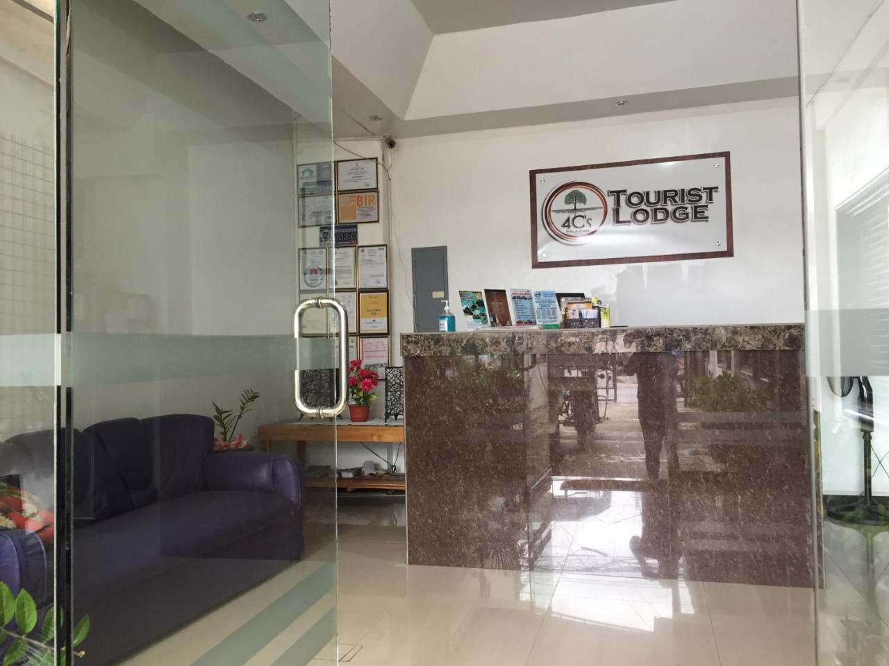 4C'S Tourist Lodge Puerto Princesa Ngoại thất bức ảnh
